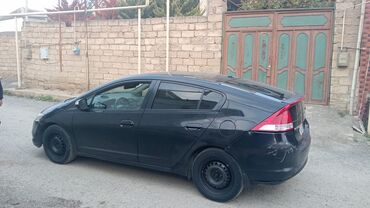 Honda: Honda Insight: 1.3 l | 2011 il Sedan — 10