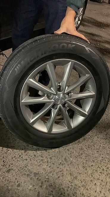 Литой диск Hyundai с шиной Hankook Описание: - Комплект: литой