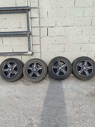 14: Комплект из 4 колес в сборе: литые диски + зимние шины Bridgestone — 1