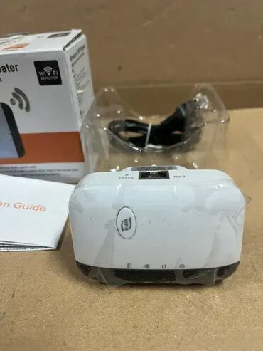 Modemi, ruteri i mrežni uređaji: *** AKCIJA *** #1205 Wireless-N WiFi Repeater; ViFi Repeater je — 5