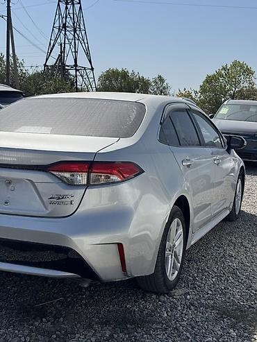 byd e6: Toyota Corolla: 2021 г., 1.8 л, Автомат, Гибрид, Седан — 5