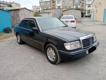 Mercedes-Benz: Mercedes-Benz 230: 2.3 l | 1990 il Sedan