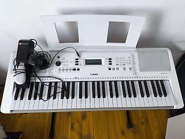 Синтезаторы: Синтезатор Yamaha EZ-300 (белый) с подсветкой клавиш - 61 — 2