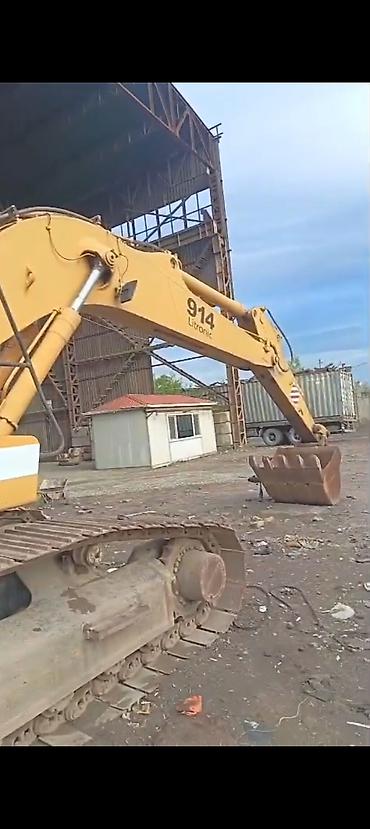 özüboşaldan yük maşınları: Ekskavator və betonqarışdıran yük maşını – tikinti və qazıntı işləri — 5
