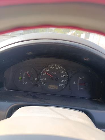 chek it: Mazda Demio: 2001 г., Автомат, Бензин, Хэтчбэк — 2