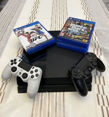 сколька стоит плейстейшен 4: Playstation 4 2 ədəd orijinal joystick, 7 oyun və kabellər daxildir