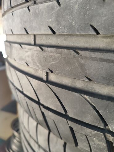 disk tekər: Yeni Şin Dunlop R 22