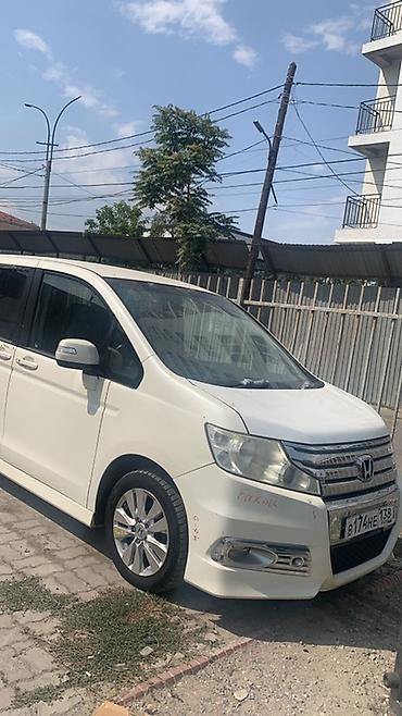 Другие автомобили: Электромобиль в синем цвете, модель 2024 года, обладает современным — 12