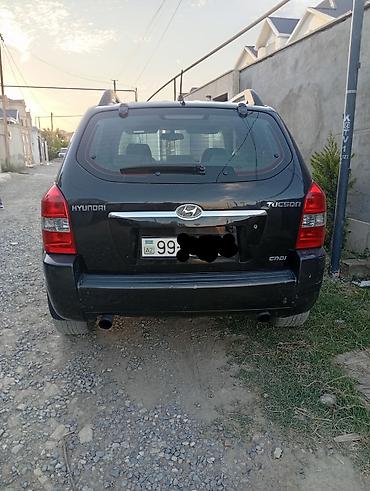 byd destroyer 05: Hyundai Tucson: 2 l | 2006 il Krossover — 2