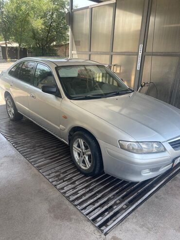 телешка авто: Mazda 626: 2001 г., 2 л, Механика, Бензин, Хэтчбэк