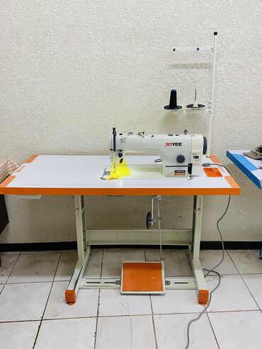 швейная машинка: Тигүүчү машина