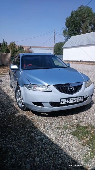мазда трибуте: Mazda 6 седан, светло‑голубой цвет кузова. Российские номерные знаки