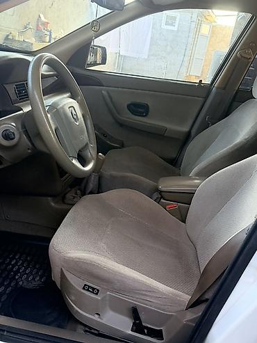 islenmis hyundai avtomobilleri satisi: Khazar LX sedan - Kuzov: ağ rəng, 4 qapılı sedan - Komplektasiya: LX — 5