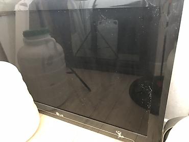 32: Телевизор LG с плоским экраном, диагональ ориентировочно 32–37". - — 2