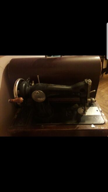 щвейная машинка: Швейная машинка Zinger (Подольск), чёрного цвета