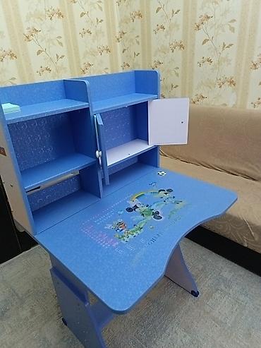 taxt 2ci əl: Uşaq üçün masa. Təcili satılır. Əla vəziyyətdədir. Eni: 75sm Uzun — 5