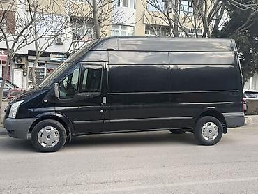 masin vinilleri: Yükdaşıma üçün geniş həcmli qara rəngli Ford Transit furqon seher — 1