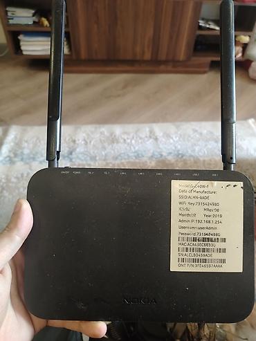optik router: Nokia G-240W-F GPON Wi‑Fi router Xüsusiyyətlər: - Model: G‑240W‑F — 3
