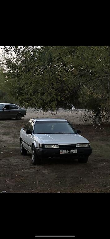 вампер 124: Mazda 626: 1994 г., 2 л, Механика, Бензин, Седан — 6