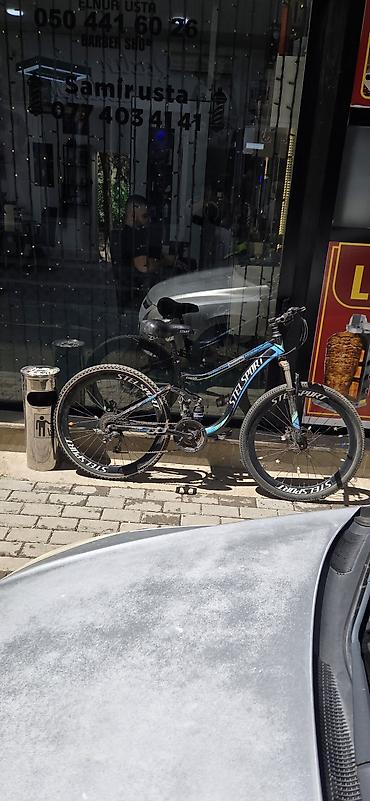 grand bicycle: STEL SPORT markalı bu dağ velosipedi qara rəngli çərçivəyə və mavi — 1