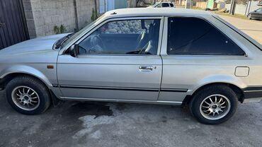 Mazda: Mazda 323: 1987 г., 1.3 л, Механика, Бензин, Купе