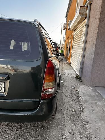 arxa yay: Opel Astra: 1.6 l | 1999 il Universal — 9
