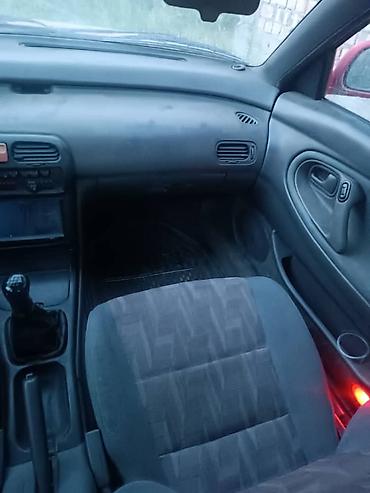 Продажа авто: Mazda Cronos: 1992 г., 2 л, Механика, Бензин, Хэтчбэк — 9