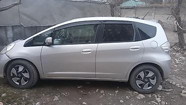 электо мото: Honda Fit: 2010 г., Вариатор, Гибрид, Хэтчбэк — 3