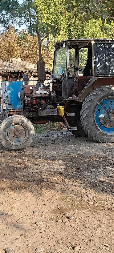 Traktorlar: Kənd təsərrüfatı üçün universal təkərli traktor. - Model tipi — 4