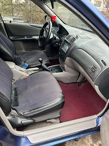 Mazda: Mazda 323: 2002 г., 1.6 л, Механика, Бензин, Хэтчбэк — 11