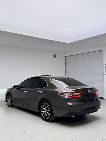 tayota progres: Toyota Camry: 2022 г., 2.5 л, Автомат, Гибрид, Седан — 4