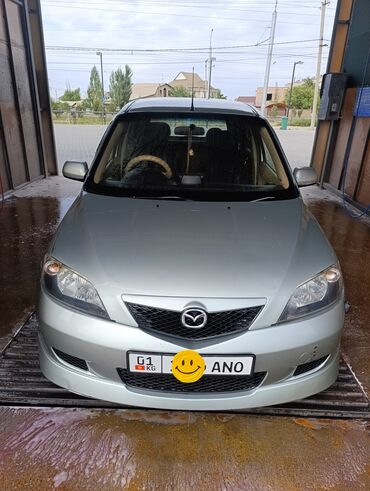 автомобили тайота: Mazda Demio: 2004 г., 1.3 л, Автомат, Бензин, Хэтчбэк