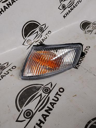 поворотка: Правый поворотник Mazda 1998 г., Новый, Аналог, Китай — 1