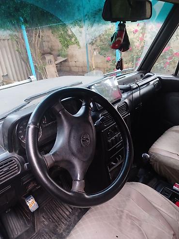 Digər avtomobillər: Off-road tipli 7 yerlik SUV - Kuzov: 5 qapılı, tavan relsləri və yan — 7