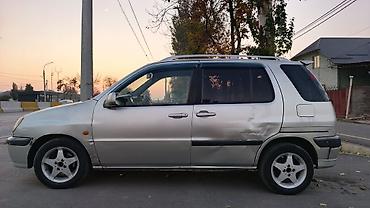 зимние шина на портер: Toyota Raum: 2000 г., 1.5 л, Автомат, Бензин, Минивэн — 5