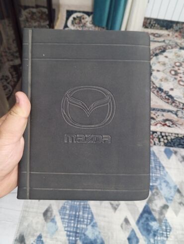 афто чихол: Оригинальный чехол-органайзер Mazda черного цвета. Внутри расположены