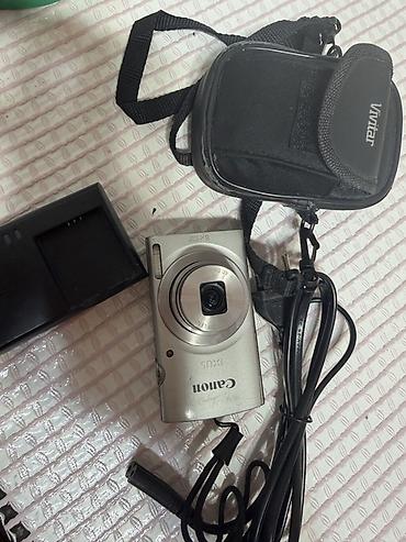 philips xenium: Компактная цифровая камера Canon IXUS (серебристая) с комплектом — 1