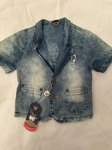 Uşaqlar üçün digər geyimlər: Butun paltarlar tezedi geyinilmeyib 1) Şalvar: - Rəng: tünd — 2