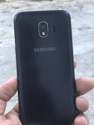 Мобильные телефоны: Samsung Galaxy J2 Core, 16 ГБ, цвет - Черный, Две SIM карты — 2