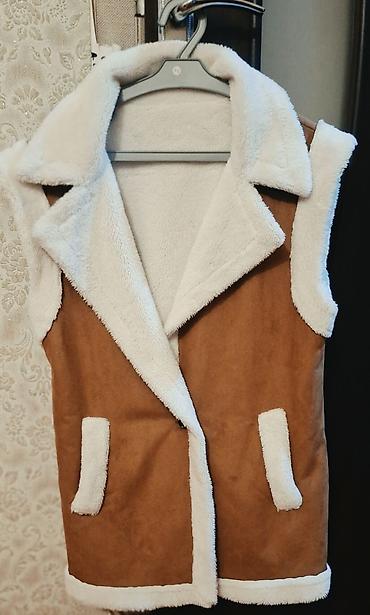 Jiletlər: Qadınlar üçün süni kürklü qolsuz jilet - Model: qolsuz, geniş — 1