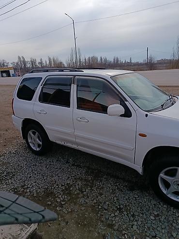клиренса: Mazda Tribute: 2000 г., 0.2 л, Автомат, Бензин, Кроссовер — 1