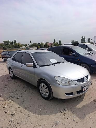 mitsubishi karisma: Mitsubishi Lancer: 2002 г., 1.6 л, Автомат, Газ, Седан — 2