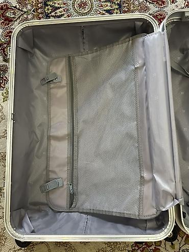 trolly bag: Чемодан на колёсах, цвет стальной синий. Особенности: - Прочный — 3