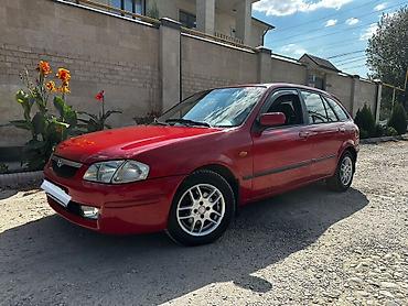 e6 3: Mazda 323: 1999 г., 1.8 л, Автомат, Бензин, Хэтчбэк — 5