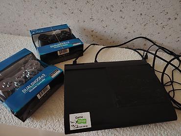 ps 3 cd: Sony PlayStation 3 Super Slim konsolu + 2 ədəd DualShock 3 simsiz pult — 4