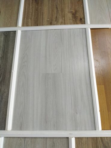 suya davamlı laminat: Laminat döşəmə panelləri – müxtəlif rəng və teksturalar - Material