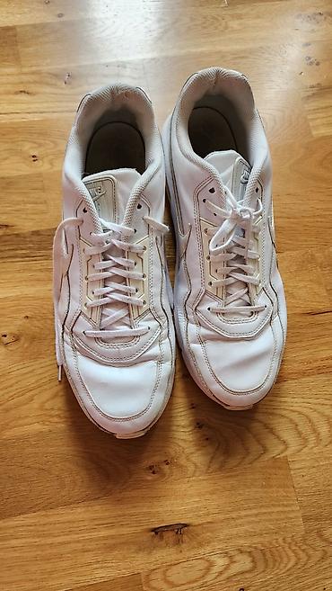 plas kisi: Nike kişi idman ayaqqabısı

- — 1