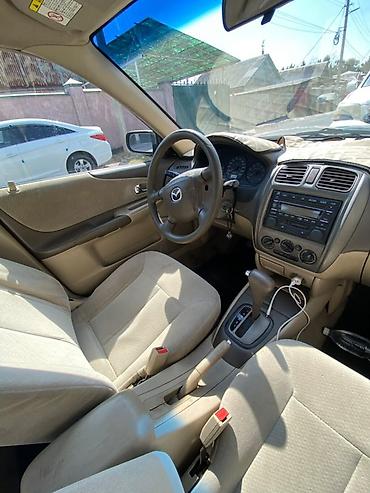 кпп «константиновка»: Mazda Familia: 2000 г., Автомат, Бензин, Седан — 2