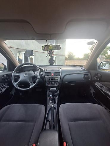 Nissan: Nissan Sunny: 1.6 l | 2007 il Sedan — 14