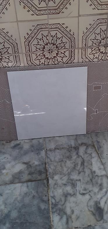 Kerma qranit heresinen 1 edetdi 1.20 ×60 biridi 0.60×0.60 a da biri 2